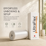 Rolled mattress beside a white UltraFlex delivery box with unbox, unroll and expand instructions.