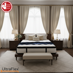 Wide bedroom view of the UltraFlex TruFirm mattress and a bench at the foot of the bed.