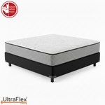 UltraFlex DreamWeaver mattress with a white quilted top and patterned grey sides on a black base.