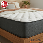 Close-up of the UltraFlex Stellar mattress corner and wave-patterned grey side panel.