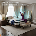 Two people on an UltraFlex TruFirm mattress in a low-motion-transfer demonstration.