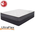 UltraFlex Prestige mattress with a diamond-quilted white top and grey sides on a dark foundation.