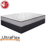UltraFlex Paradise mattress with a quilted white top and light grey sides on a dark foundation.