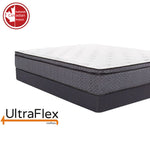 Alternate corner view of the UltraFlex Revive mattress and dark foundation.