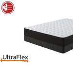 Close-up of the UltraFlex Purity mattress corner above a dark foundation.