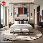 Bedroom with cream bedding, a tall upholstered headboard and colourful abstract wall art.