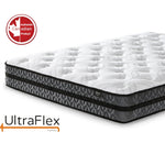 Close-up of the UltraFlex Joy mattress corner and dark patterned side panels.