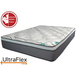 UltraFlex Fantasy mattress with a raised quilted top and grey side panels, shown at an angle.