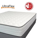 UltraFlex Glory mattress showing its quilted surface and dark edge piping.