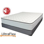 UltraFlex Glory mattress with a white quilted top and grey sides, shown at an angle.