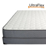Front view of the UltraFlex mattress with quilted top and layered grey side profile.