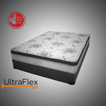 UltraFlex Trinity mattress with a floral quilted cover on a dark foundation.